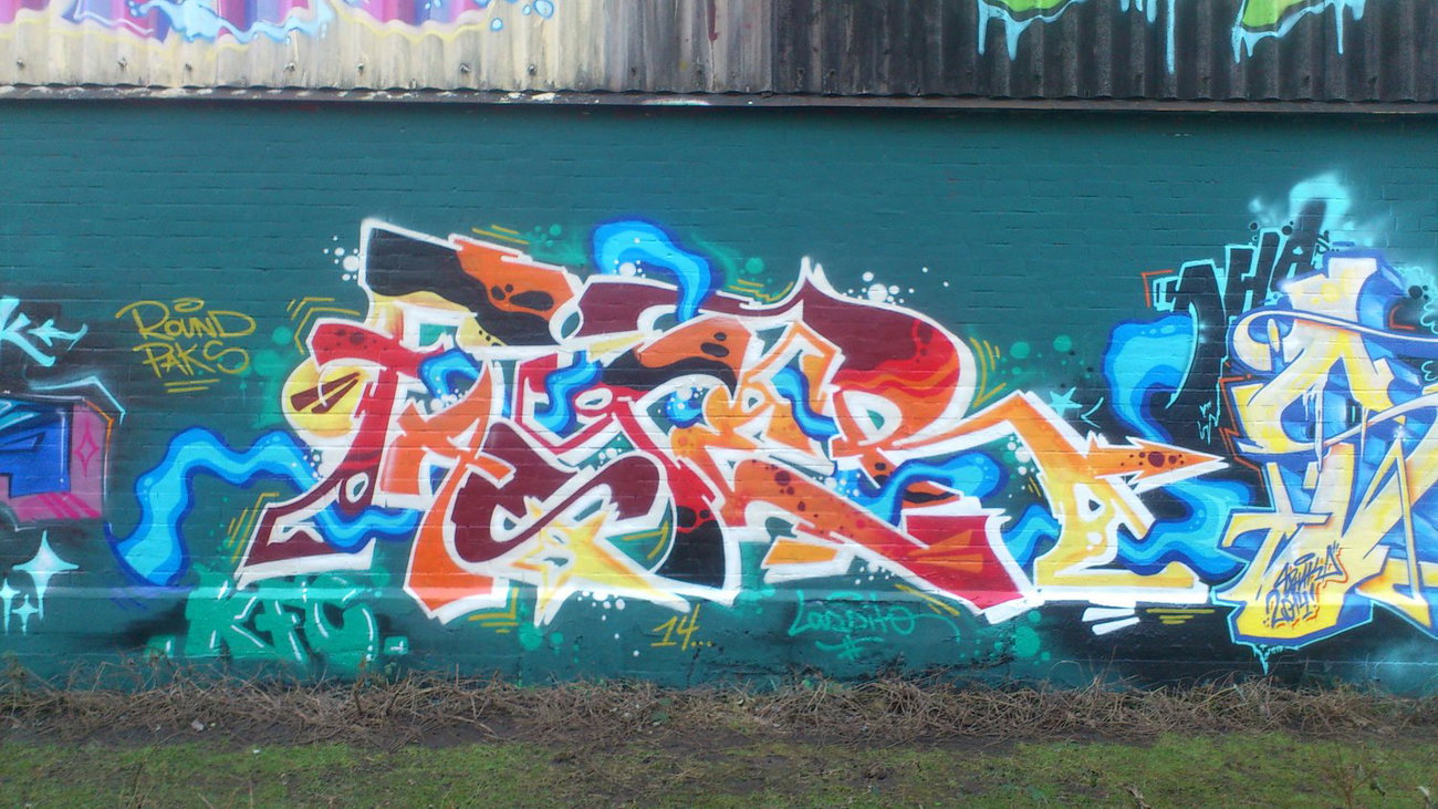 Graffiti Wall - Photo by kieltaggsatnight - Faster (2014)
