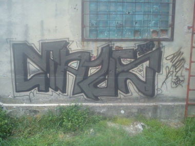 Graffiti Bombing - Photo by krucifiX_kLan