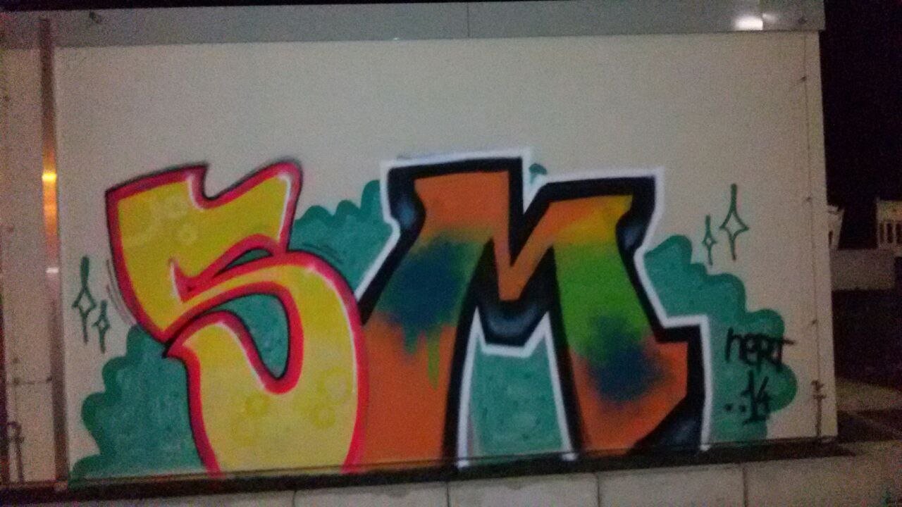 Graffiti Bombing - Photo by madmax - sm, mies, nert (2014)