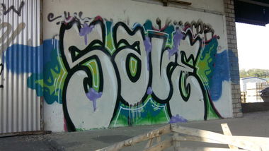 Graffiti Wall - Photo by mirakoli - nail, save