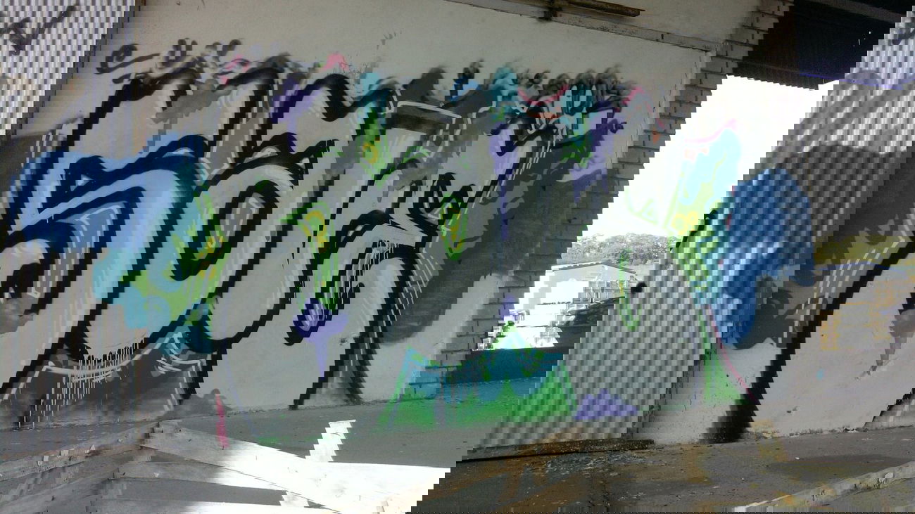 Graffiti Wall - Photo by mirakoli - nail, save