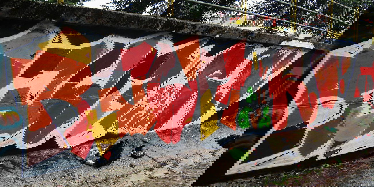 Graffiti Wall in Ro?ava - Photo by muyer - REUM, RO, OUS (2011)