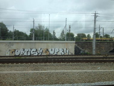 Graffiti Bombing in Linz - Photo by okeey - Curtis, Supr, Super (2014)