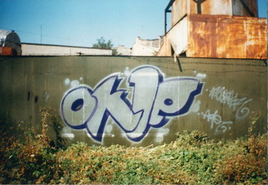 Graffiti Bombing - Photo by okie735 - afc, 735, okie (2004)