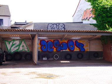 Graffiti Bombing - Photo by oldenburgcity - vza, aesop, pair