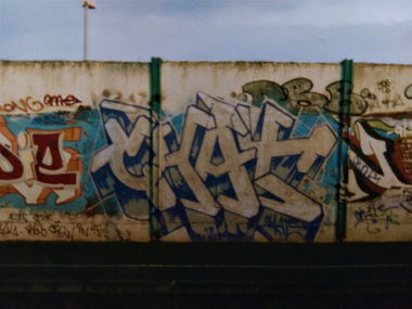 Graffiti Wall in Mannheim - Photo by ovakill - CHAT, Train, Line