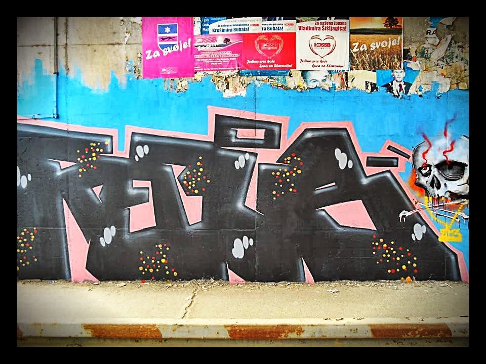Graffiti Wall - Photo by pannonian - Rebus