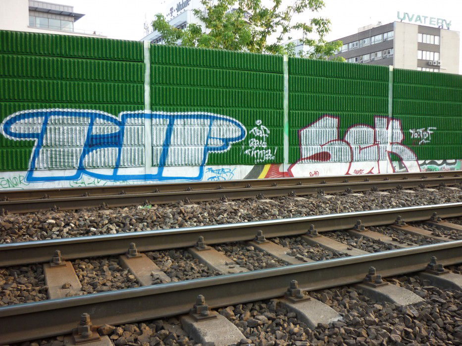 Graffiti Bombing in budapest - Photo by plasticdopesme - wall, train, line