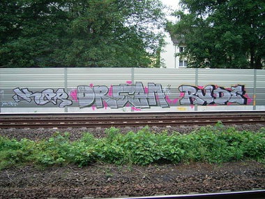 Graffiti Bombing - Photo by reuhber - ker, dream, rude