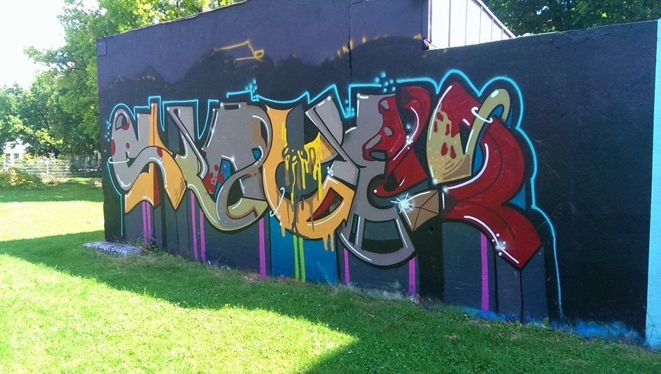 Graffiti Wall - Photo by schwarzanabu - Slayer