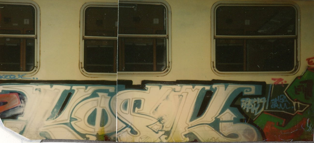 Graffiti Train - Photo by suburban - KOSK, SMBA, CAM (1996)