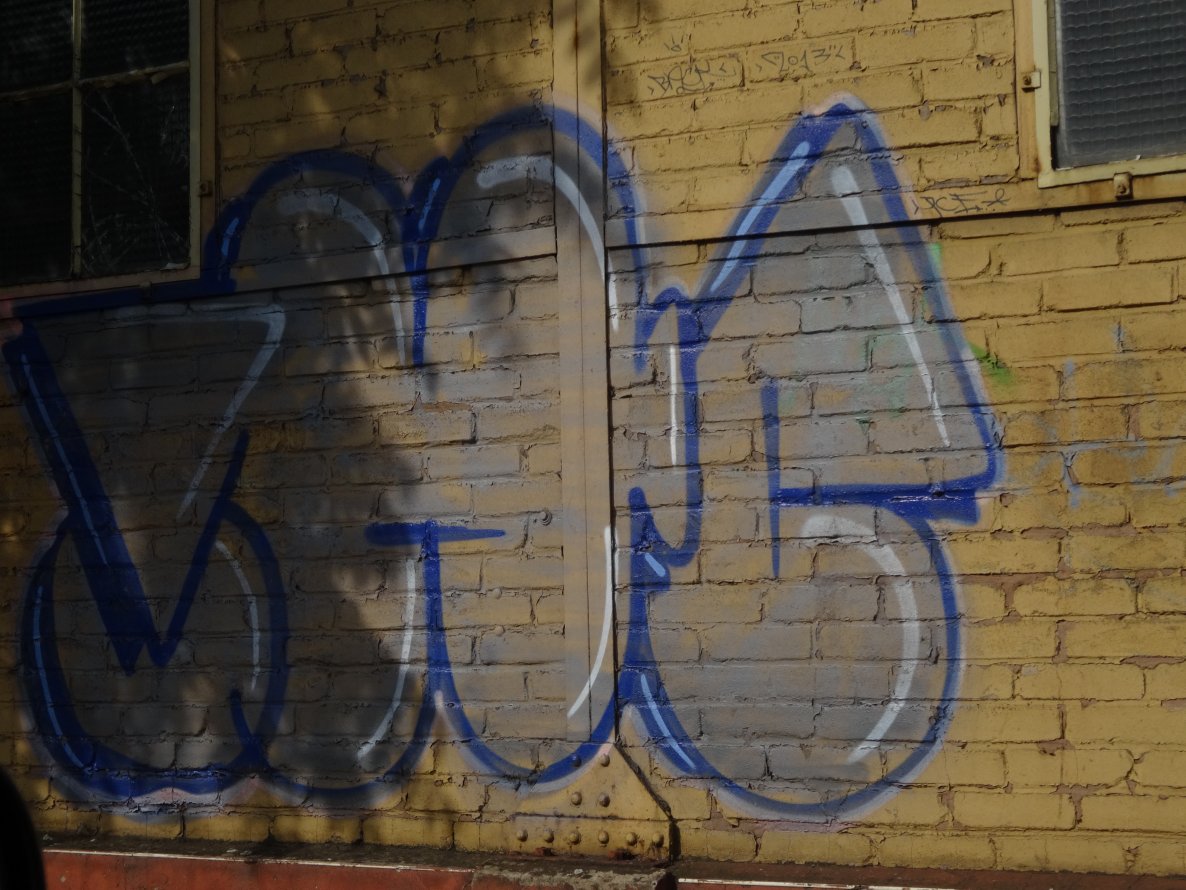 Graffiti Bombing - Photo by teaka - IMC, RMT (2013)