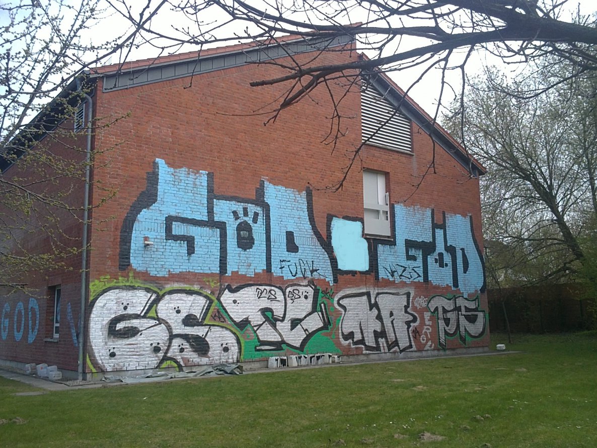 Graffiti Bombing - Photo by unknown - god, mfg (2011)