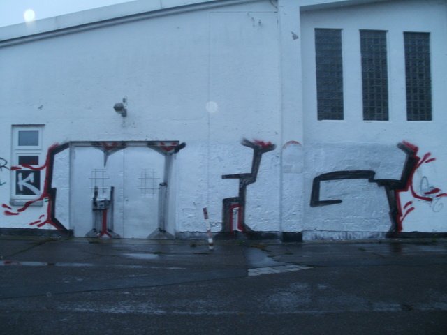 Graffiti Bombing - Photo by unknown - god, mfg (2013)