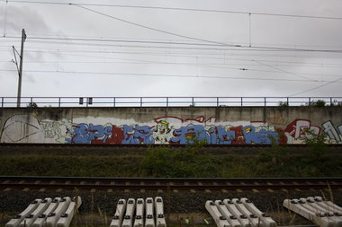 Graffiti Wall in Köln - Photo by wallsdontlie - spider, biker, train