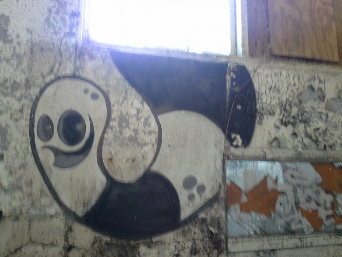 Graffiti Wall - Photo by whenyourstrange - patch, whiskey, worm