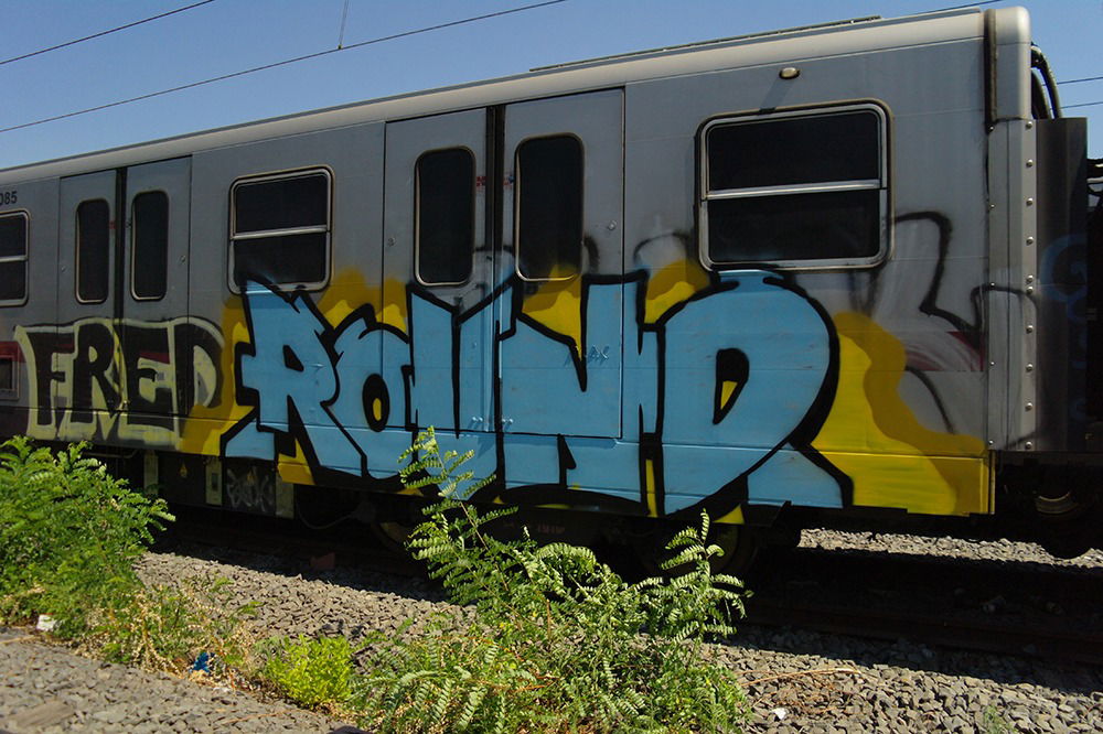Graffiti Train - Photo by zzzzz - Round